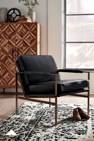 Puckman Black Accent Chair By Ashley Furniture With Its Ultra Modern Vibe And Ultra Indulgent Feel In 2020 Black Accent Chair Accent Chairs Black Leather Upholstery