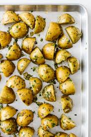 Spread the coated potatoes on a large parchment paper lined baking sheet. Garlic Herb Roasted Potatoes Easy Oven Roasted Potatoes Downshiftology
