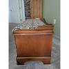 One functional shelf is present below the chest. 1