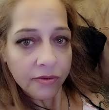 What are some suggestions for a large metal kennel for a nervous dog during  storms and loud noises?