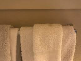 Stick to the basics with absorbent ones in white or grey, or try black for something bolder. How The Towels Looked When I Walked Into The Bathroom Not Sure What The Grey Spot Was Or Why The Other Wash Rag Was Grey Picture Of Woodspring Suites Jacksonville Southeast