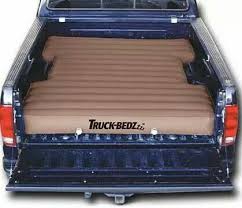 Truck Beds Designed An Air Mattress That Fits In The Bed Of Tour Truck Around The Wheel Hubs Amazing Idea Truck Bed Camping Truck Camping Truck Tent