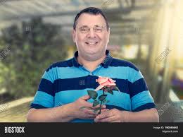 Having a naturally high capacity for fat cells within the body while maintaining a normal human shape; Smiling Chubby Faced Image Photo Free Trial Bigstock