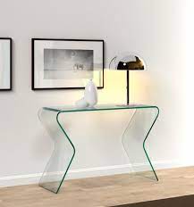 A console table can be functional and stylish in a bedroom. Make A Stylish Statement With Console Table Decor