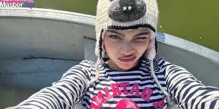 Ariana Greenblatt spread white sheets