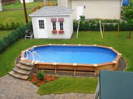 I Like The Steps The Fact They Are Stone Concrete Instead Of Wood Keeps Wasps From Wantin Above Ground Pool Landscaping Above Ground Pool Decks Backyard Pool