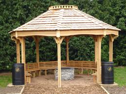 Enclosed gazebo with fire pit. Outdoor Cooking Fire Pit Shelter The Hideout House Company