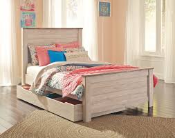 The sturdy wood frame of the iselin is finished in brown and complemented by the dark grey fabric upholstery of the headboard, wh. Willowton Whitewash Full Panel Bed With Trundle Under Bed Storage On Sale At Montana S Home Furniture Serving Houston Tx