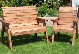 The uk's largest rattan garden furniture retailer. Hand Made 3 Seater Chunky Rustic Wooden Garden Furniture Companion Set Cheaper Online Co Uk