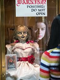 'she's in a case for a reason': Annabelle Comes Home Tracking Annabelle In The Conjuring Movies Ew Com