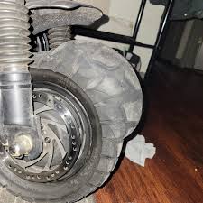 Tire lost the fight, got lumped up by the streets.