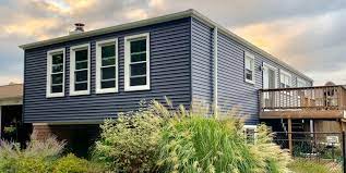 Using warm water and adding detergent is even more effective. Painting Old Vinyl Siding Vs Siding Replacement Pros Cons