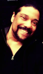 KISS now in their 70's next to themselves when they were in their 20's.