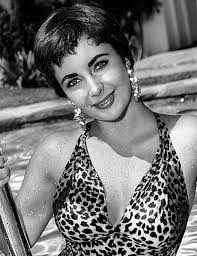 There were exceptions, however, and some women, such as bettie page, favored long, straight dark. Elizabeth Taylor Taking A Swim And Looking Great Even With Short Hair And Her Animal Print Bathing Suit 1950s
