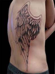 Attractive Angel Wings Tattoo Meanings On Back Side Tattoos Angel Wings Tattoo Thigh Tattoo Men