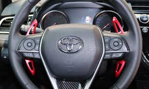 In most cars that i've seen/driven, when i use the paddle shifter the car would automatically upshift and allow you to get to the highest gear quickly to save gas. Red Steering Wheel Larger Paddle Shifter Extension Covers For 18 Up Toyota Camry Ijdmtoy Com