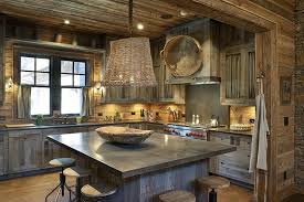 This Kitchen Uses Cabinets Made From Aged Gray Barn Wood To Create The Look And Feel Of An Old Cabin An An Rustic Kitchen Cabin Kitchens Rustic Renovations