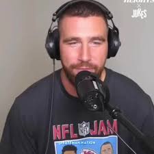 Travis Kelce Body Slam by Derwin James