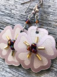Learn how to combine our earring cut files with leatherette sheets to make your own layered leather earrings with your cricut explore air 2. Make Easy Diy Earrings With Iron On Vinyl And Leather 100 Directions