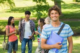 Boy With College Friends In Background At Campus College Friends Campus College