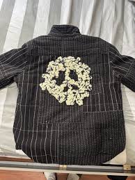 DENIM TEARS × Levi's Peace Patchwork Padded Jacket