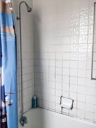 The Best Thing We Did To This Rental Bathroom Was Almost Free Cleaning Shower Tiles Shower Tile Cleaner Shower Tile