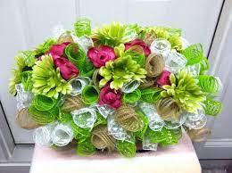 Making a flower arrangement that fits over the top of a headstone is not difficult,. My First Gravesite Saddle Using Deco Mesh Memorial Flowers Headstones Decorations Cemetary Flowers