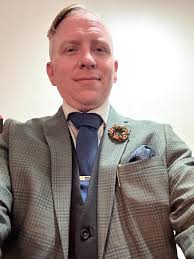 Blue-jean, orange polo, olive green outfit ideas