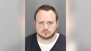 Oakland County Sheriff's deputy charged for allegedly trying to solicit a  minor for sex