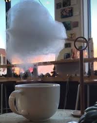 A place in Ohio does sugar clouds over cups of coffee. Just what I wanted,  sticky sugar all over the sides of my coffee mug. And if I move the mug, it
