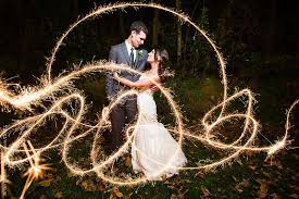 The original wedding sparklers on facebook. Stocksy United Royalty Free Stock Photos Sparkler Wedding Exit By Brian Powell Wedding Sparklers Sparkler Exit Wedding Wedding Photography