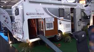 Rv with built in dog kennel. A Motorhome For Dogs The Dog Liner T730 Youtube
