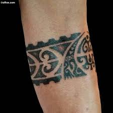 Some tribal people would get forearm tattoos to signify being a member of a certain social class or group while others were tattooed with their specific trade in life, like a baker or carpenter. Black Ink Fabulous Maori Armband Tattoo On Men Forearm Segerios Com