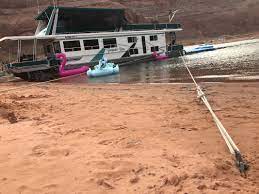 Conduct a planned approach including speed reduction in ample time and orienting the ship's head before anchoring to (a) same as similar sized vessels around or (b) stem the tide or wind. How We Anchor A Houseboat Dooley S At Lake Powell