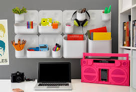 Her work has been featured in architectural… Make Work Slightly More Bearable With These Fun Cubicle Decor Ideas