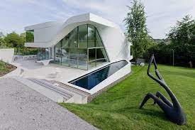 Hidden in the back yard of a bustling suburban neighbourhood is a remarkable small family home. Super Modern Suburban House