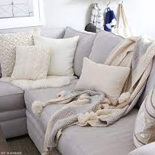 When most people think of throw blankets, they image a casual setting. The Right Way To Display Throw Blankets On Your Couch The Diy Playbook