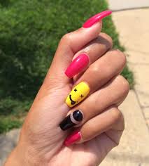 Pink Nails With Yellow Drunken Smiley Face And Black Separated Long Nails Design Pink Black Nails Pretty Acrylic Nails Nails