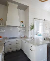 This setup is totally practical and the pop of blue adds life and colour to this space. Small U Shaped Kitchen Design Ideas