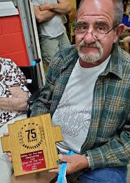 Justin Graham was honored with an award last evening at the 75th Dellroy  Homecoming as the "2024 Fire Chief of the Year" for his years of dedication  to Dellroy Fire Station 22 (DVFD).