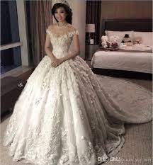 2018 Luxury Arabic Ball Gown Wedding Dresses Off Shoulder Cap Sleeves Lace Appliques 3d Flowers Puffy Chapel Train Plus Size Bridal Gowns Classy Wedding Dresses Ball Gown Wedding Dress Ball Gowns