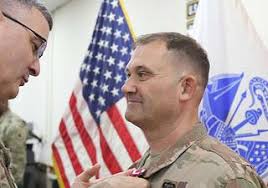 Maj. Robert Bourne, 184th Sustainment Command, is awarded