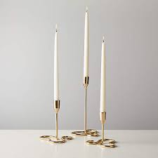 Typically, the cold will cause the candle wax to shrink and become hard. Motion Brass Taper Candle Holders Set Of 3 Cb2