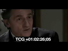 Assante from overcoat