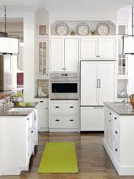 10 Stylish Ideas For Decorating Above Kitchen Cabinets Top Of Kitchen Cabinet Decor Ideas Kitchen Decoration Above Decorating Kitchendecoration