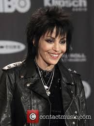 Then quickly go over thin sections at the ends with irons so hair kicks out. Joan Jett Rocker Hair Joan Jett Short Hair Styles