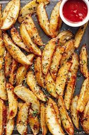 Crispy Garlic Baked Potato Wedges Cafe Delites Recipe Recipes Food Potato Wedges Baked