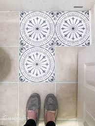 Bare concrete is best when applying peel and stick flooring. Diy Peel And Stick Vinyl Floor Tile The Turquoise Home