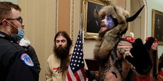 Jake angeli rannte mit megaphon durchs washingtoner kapitol. Qanon Influencer Q Shaman Arrested For Role In Dc Capitol Siege
