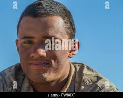 U.S. Marine Lance Cpl. Derrick Zapien, drafter and surveyor, with Marine  Wings Support Squadron 172, poses for a photograph at the Wat Khun Song  School, Chanthaburi, Thailand, during Exercise Cobra Gold, Feb.